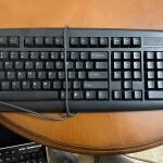 Wired keyboards, one with Large Print/Braille